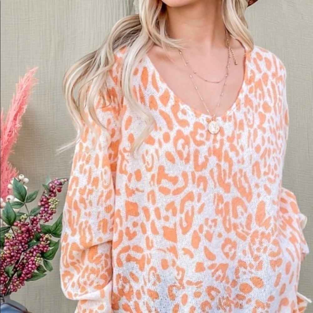 NEW WOMENS ORANGE LEOPARD SWEATER